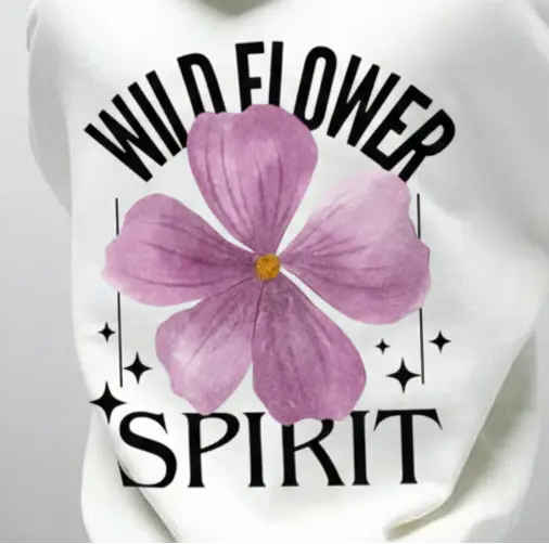 Person wearing a white hoodie with a purple flower and text design on the back, against a gray background.